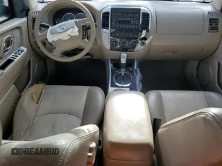 2007 Mercury Mariner Premier z VIN 4M2CU87147KJ17376, wystawiony jako Copart lot #51513755 z przebiegiem 93 763 mil mil oraz Szkody całkowita. Historia ofert i sprzedaży dostępna na DreamBid. Obrazek 8.