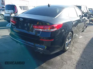 2019 Kia Optima LX with VIN 5XXGT4L32KG324877, listed as a IAAI auction lot 41713482 with 160,178 mi miles. Bid and sale history available at carsss.com. Image 4.