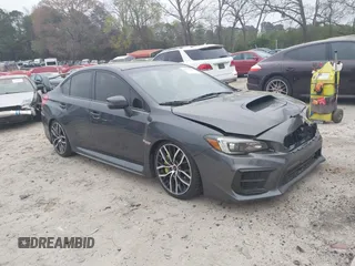2020 Subaru WRX STI with VIN JF1VA2E65L9832757, listed as a IAAI auction lot 41938409 with 45,606 mi miles and . Bid and sale history available at DreamBid. Image 1.