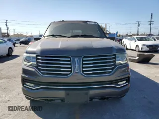 2015 Lincoln Navigator z VIN 5LMJJ3HT2FEJ12367, wystawiony jako Copart lot #56930865 z przebiegiem 71 415 mil mil oraz Szkody całkowita. Historia ofert i sprzedaży dostępna na DreamBid. Obrazek 5.