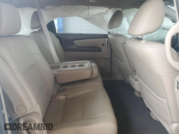 2017 Honda Odyssey Touring with VIN 5FNRL5H94HB007979, listed as a Copart auction lot 56755435 with 125,821 mi miles and Salvage title. Bid and sale history available at DreamBid. Image 11.
