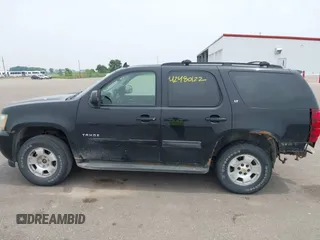 2009 Chevrolet Tahoe 1LT z VIN 1GNFK23009R297220, wystawiony jako IAAI lot #42480122 z przebiegiem 256 343 mil mil oraz . Historia ofert i sprzedaży dostępna na DreamBid. Obrazek 14.