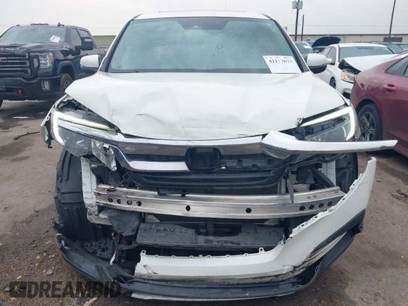 2019 Honda Pilot EX-L with VIN 5FNYF6H52KB025930, listed as a IAAI auction lot 42117673 with 84,721 mi miles and . Bid and sale history available at DreamBid. Image 12.