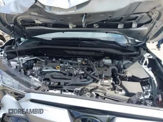 2023 Toyota Corolla Cross Hybrid S with VIN 7MUFBABG1PV014992, listed as a IAAI auction lot 42202656 with 18,913 mi miles and . Bid and sale history available at DreamBid. Image 10.