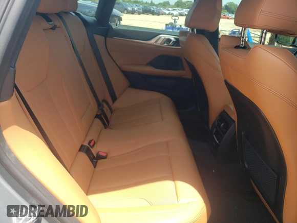 2023 BMW i4 eDrive40 with VIN WBY73AW08PFN75939, listed as a Copart auction lot 56928064 with 10,295 mi miles and Salvage Title. Bid and sale history available at carsss.com. Image 10.