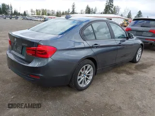 2018 BMW 3 Series 320i xDrive with VIN WBA8E5G53JNV03333, listed as a IAAI auction lot 42018275 with 45,950 mi miles. Bid and sale history available at carsss.com. Image 4.