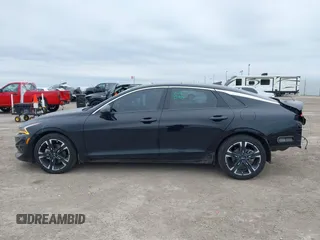 2021 Kia K5 GT-Line z VIN 5XXG64J22MG008335, wystawiony jako IAAI lot #41633257 z przebiegiem 90 534 mil mil oraz . Historia ofert i sprzedaży dostępna na DreamBid. Obrazek 14.