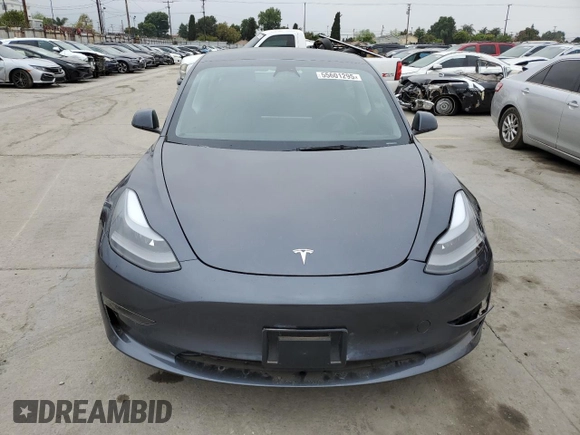 2023 Tesla Model 3 with VIN 5YJ3E1EA3PF697049, listed as a Copart auction lot 55601295 with 12,373 mi miles and Salvage Title. Bid and sale history available at DreamBid. Image 5.