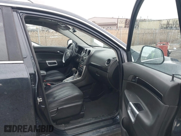 2014 Chevrolet Captiva Sport LT z VIN 3GNAL3EK5ES663143, wystawiony jako IAAI lot #41669555 z przebiegiem 99 880 mil mil oraz . Historia ofert i sprzedaży dostępna na DreamBid. Obrazek 5.
