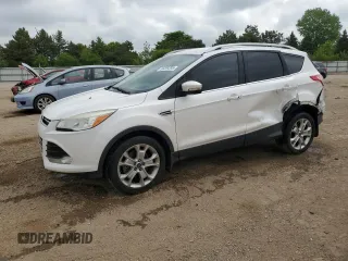 2014 Ford Escape Titanium с VIN 1FMCU0J93EUC35437, выставлен на аукционе Copart как лот 56299395 с пробегом 130 770 миль миль и Списание • Salvage title. История ставок и продаж доступна на DreamBid. Изображение 1.