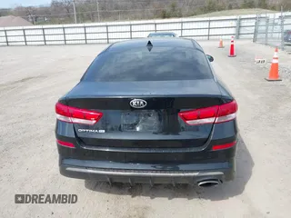 2019 Kia Optima LX with VIN 5XXGT4L33KG373375, listed as a IAAI auction lot 42005817 with 77,524 mi miles and . Bid and sale history available at carsss.com. Image 16.