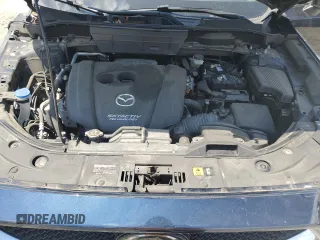 2018 Mazda CX-5 Touring with VIN JM3KFBCMXJ0460020, listed as a Copart auction lot 55997305 with 56,361 mi miles and Salvage Title. Bid and sale history available at DreamBid. Image 12.