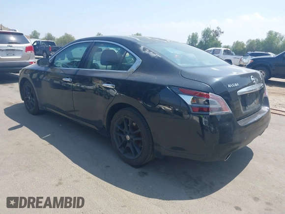 2014 Nissan Maxima S with VIN 1N4AA5AP8EC469519, listed as a IAAI auction lot 42180940 with 119,966 mi miles and . Bid and sale history available at DreamBid. Image 3.