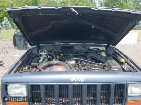 2001 Jeep Cherokee Sport z VIN 1J4FF48S51L531033, wystawiony jako IAAI lot #42423910 z przebiegiem 90 438 mil mil oraz . Historia ofert i sprzedaży dostępna na DreamBid. Obrazek 10.