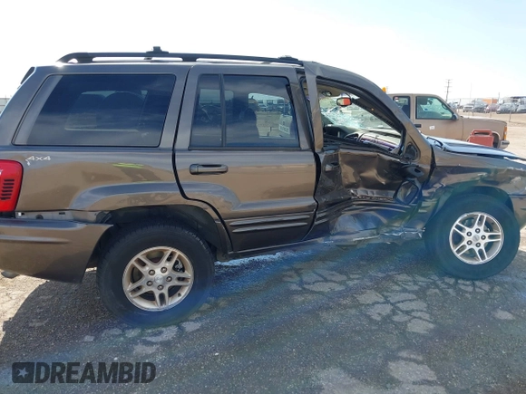 1999 Jeep Grand Cherokee Limited with VIN 1J4GW68N5XC773100, listed as a IAAI auction lot 41998432 with Not provided miles and . Bid and sale history available at DreamBid. Image 6.