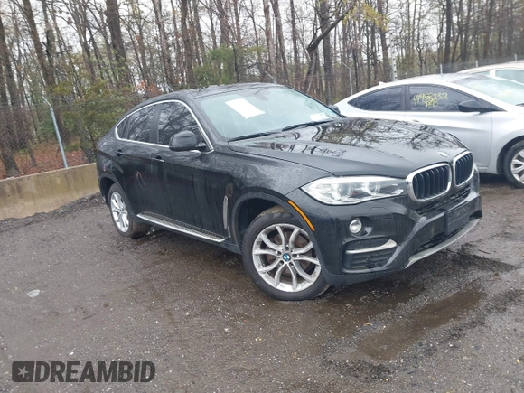 2015 BMW X6 xDrive35i with VIN 5UXKU2C53F0N76799, listed as a IAAI auction lot 41946628 with 173,607 mi miles. Bid and sale history available at carsss.com. Image 1.