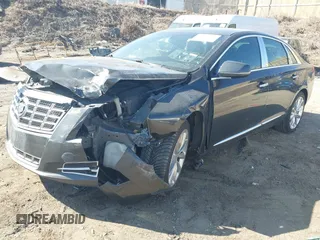 2013 Cadillac XTS Luxury with VIN 2G61R5S32D9223380, listed as a IAAI auction lot 41881602 with 335,780 mi miles. Bid and sale history available at carsss.com. Image 17.