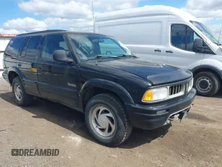 1997 Oldsmobile Bravada z VIN 1GHDT13W3V2707243, wystawiony jako IAAI lot #42024114 z przebiegiem 185 219 mil mil oraz . Historia ofert i sprzedaży dostępna na DreamBid. Obrazek 1.