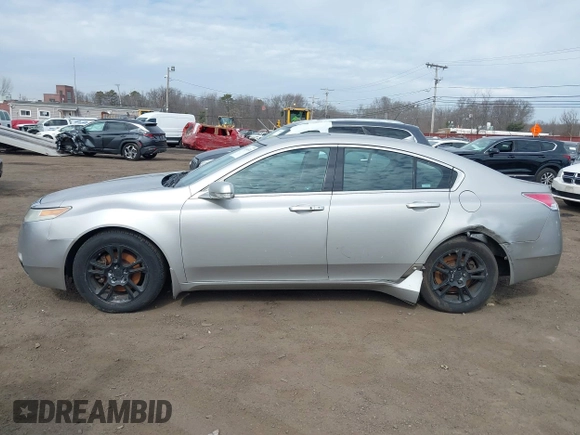 2009 Acura TL Tech with VIN 19UUA86519A013039, listed as a IAAI auction lot 41656570 with 241,217 mi miles. Bid and sale history available at carsss.com. Image 14.