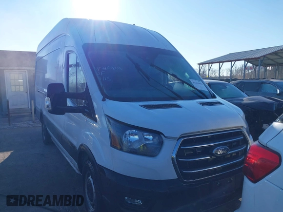 2020 Ford Transit Cargo with VIN 1FTBW3X82LKA91396, listed as a IAAI auction lot 41310803 with 60,760 mi miles and . Bid and sale history available at DreamBid. Image 12.