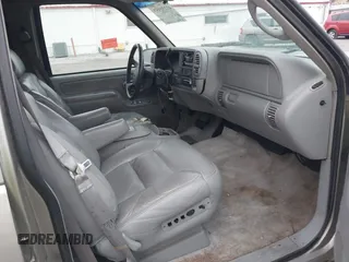 1999 GMC Yukon with VIN 1GKEK13R7XJ753243, listed as a IAAI auction lot 41231957 with 207,092 mi miles. Bid and sale history available at carsss.com. Image 5.