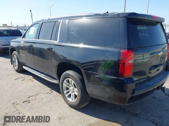 2019 Chevrolet Suburban LT with VIN 1GNSKHKC3KR285095, listed as a IAAI auction lot 41851014 with 151,075 mi miles and . Bid and sale history available at DreamBid. Image 3.