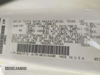 2013 Toyota Tacoma with VIN 5TFTX4CNXDX030000, listed as a IAAI auction lot 42098777 with 198,791 mi miles and . Bid and sale history available at DreamBid. Image 9.