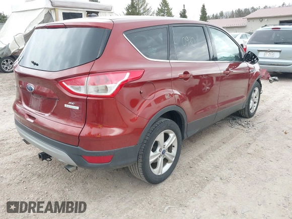 2014 Ford Escape SE with VIN 1FMCU0GX4EUA93413, listed as a IAAI auction lot 42060910 with 132,515 mi miles. Bid and sale history available at carsss.com. Image 4.