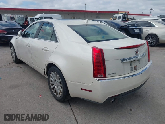 2012 Cadillac CTS Luxury with VIN 1G6DF5E50C0131857, listed as a IAAI auction lot 42610389 with 85,896 mi miles and . Bid and sale history available at DreamBid. Image 3.