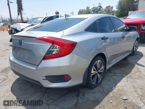 2018 Honda Civic EX-L z VIN JHMFC1F79JX037843, wystawiony jako IAAI lot #42121623 z przebiegiem 49 759 mil mil oraz . Historia ofert i sprzedaży dostępna na DreamBid. Obrazek 4.