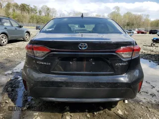 2021 Toyota Corolla Hybrid LE with VIN JTDEAMDE1MJ002887, listed as a Copart auction lot 53092595 with 65,547 mi miles and Salvage Title. Bid and sale history available at carsss.com. Image 6.
