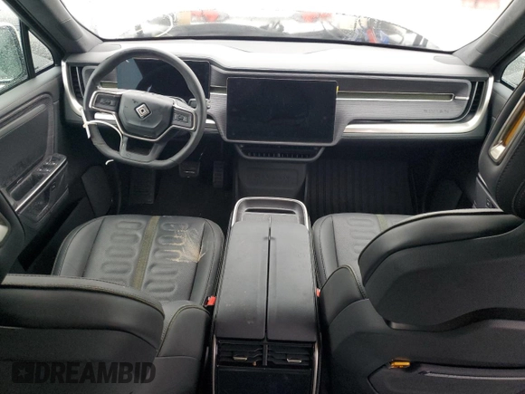 2025 Rivian R1S Adventure z VIN 7PDSGBBA3SN046975, wystawiony jako Copart lot #42880125 z przebiegiem Nie podano mil oraz Szkoda całkowita • Salvage title. Historia ofert i sprzedaży dostępna na DreamBid. Obrazek 8.