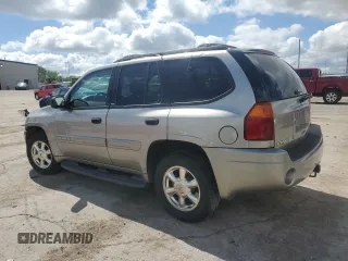 2002 GMC Envoy SLT z VIN 1GKDS13S722253150, wystawiony jako Copart lot #56255185 z przebiegiem 174 198 mil mil oraz Szkoda całkowita • Salvage title. Historia ofert i sprzedaży dostępna na DreamBid. Obrazek 2.