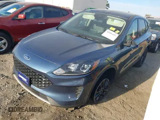 2020 Ford Escape SE Sport Hybrid with VIN 1FMCU9BZ2LUC50527, listed as a IAAI auction lot 41816035 with 84,533 mi miles and . Bid and sale history available at DreamBid. Image 2.