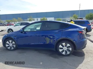 2020 Tesla Model Y Long Range with VIN 5YJYGDEE1LF006227, listed as a IAAI auction lot 42100833 with 49,761 mi miles and . Bid and sale history available at DreamBid. Image 15.