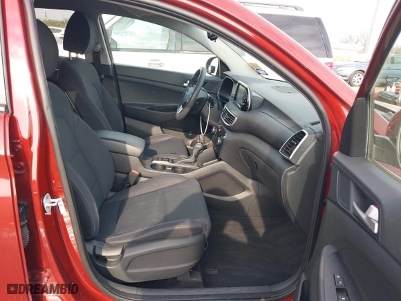2019 Hyundai Tucson Value with VIN KM8J33A42KU861329, listed as a IAAI auction lot 41679185 with 65,304 mi miles. Bid and sale history available at carsss.com. Image 5.