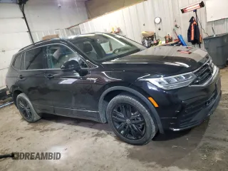 2022 Volkswagen Tiguan SE R-Line Black with VIN 3VV8B7AX8NM102055, listed as a Copart auction lot 47085015 with 20,007 mi miles and Salvage Title. Bid and sale history available at DreamBid. Image 4.