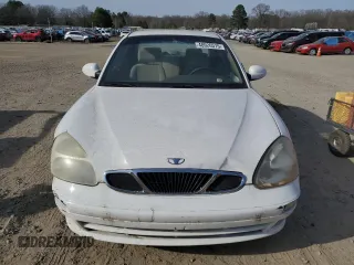 2001 Daewoo Nubira z VIN KLAJC52Z01K711120, wystawiony jako Copart lot #48926575 z przebiegiem 103 375 mil mil oraz Tytuł czysty. Historia ofert i sprzedaży dostępna na DreamBid. Obrazek 5.