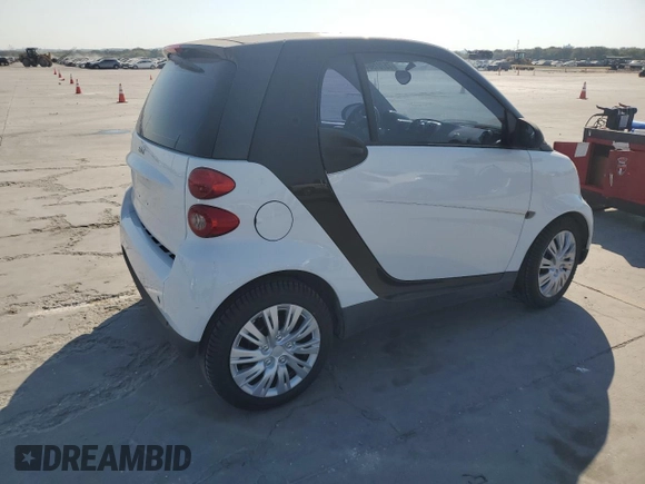 2012 Smart fortwo Pure z VIN WMEEJ3BA5CK540092, wystawiony jako Copart lot #75701964 z przebiegiem 59 355 mil mil oraz Szkody całkowita. Historia ofert i sprzedaży dostępna na DreamBid. Obrazek 3.