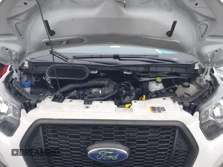2021 Ford Transit Cargo with VIN 1FTBR1Y87MKA76372, listed as a IAAI auction lot 42251675 with 98,072 mi miles and . Bid and sale history available at DreamBid. Image 10.