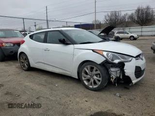 2017 Hyundai Veloster with VIN KMHTC6AD8HU310860, listed as a Copart auction lot 42170923 with 97,009 mi miles. Bid and sale history available at carsss.com. Image 4.