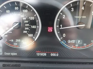 2014 BMW 5 Series 535i with VIN WBA5B1C5XED481210, listed as a IAAI auction lot 41871560 with 131,826 mi miles. Bid and sale history available at carsss.com. Image 7.