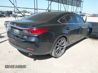 2015 Mazda 6 i Grand Touring with VIN JM1GJ1W59F1179548, listed as a IAAI auction lot 42004860 with 153,532 mi miles and . Bid and sale history available at DreamBid. Image 4.