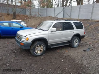 1997 Toyota 4Runner SR5 with VIN JT3HN86R3V0129922, listed as a IAAI auction lot 41920909 with 217,195 mi miles. Bid and sale history available at carsss.com. Image 2.