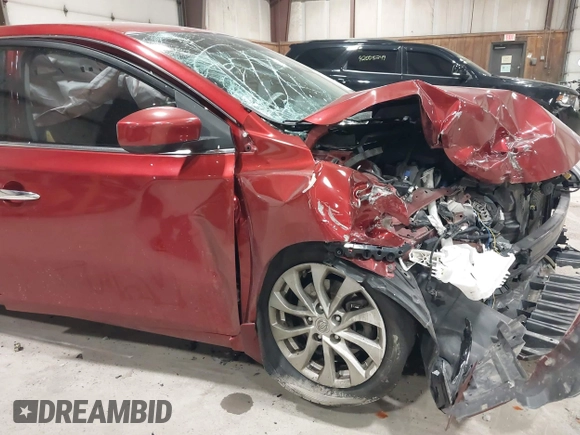 2019 Nissan Sentra S z VIN 3N1AB7AP7KY257283, wystawiony jako IAAI lot #42012338 z przebiegiem 103 503 mil mil oraz . Historia ofert i sprzedaży dostępna na DreamBid. Obrazek 6.