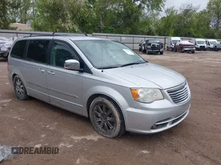 2011 Chrysler Town & Country Touring-L with VIN 2A4RR8DGXBR734005, listed as a IAAI auction lot 41874573 with 170,215 mi miles. Bid and sale history available at carsss.com. Image 1.