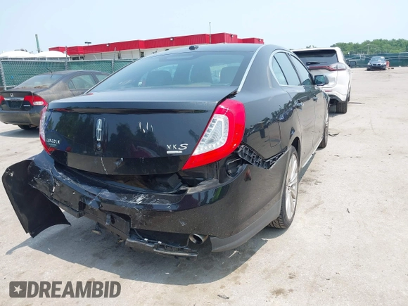 2013 Lincoln MKS EcoBoost with VIN 1LNHL9FT3DG602190, listed as a IAAI auction lot 42483472 with 63,238 mi miles and . Bid and sale history available at DreamBid. Image 6.