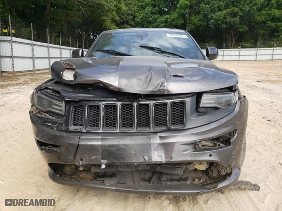 2015 Jeep Grand Cherokee SRT with VIN 1C4RJFDJ9FC842448, listed as a Copart auction lot 56956284 with 178,141 mi miles and Salvage Title. Bid and sale history available at carsss.com. Image 5.