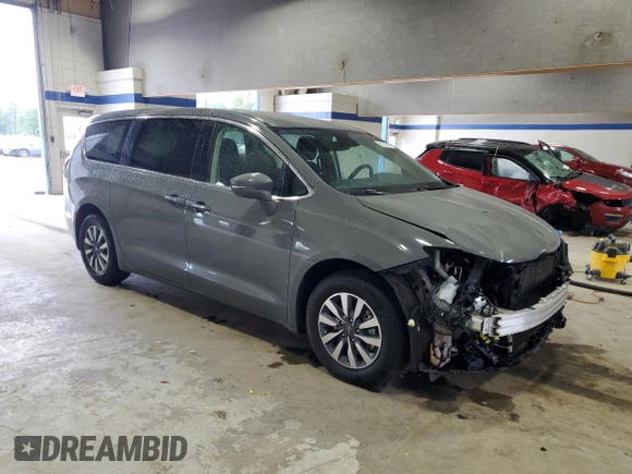 2021 Chrysler Pacifica Hybrid Touring L with VIN 2C4RC1L72MR596429, listed as a Copart auction lot 53859345 with 97,218 mi miles and Salvage title. Bid and sale history available at DreamBid. Image 4.