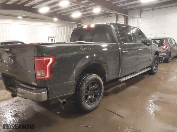 2015 Ford F-150 XLT w/HD Payload Pkg with VIN 1FTFW1EG8FFB59391, listed as a IAAI auction lot 41520010 with 119,414 mi miles. Bid and sale history available at carsss.com. Image 4.